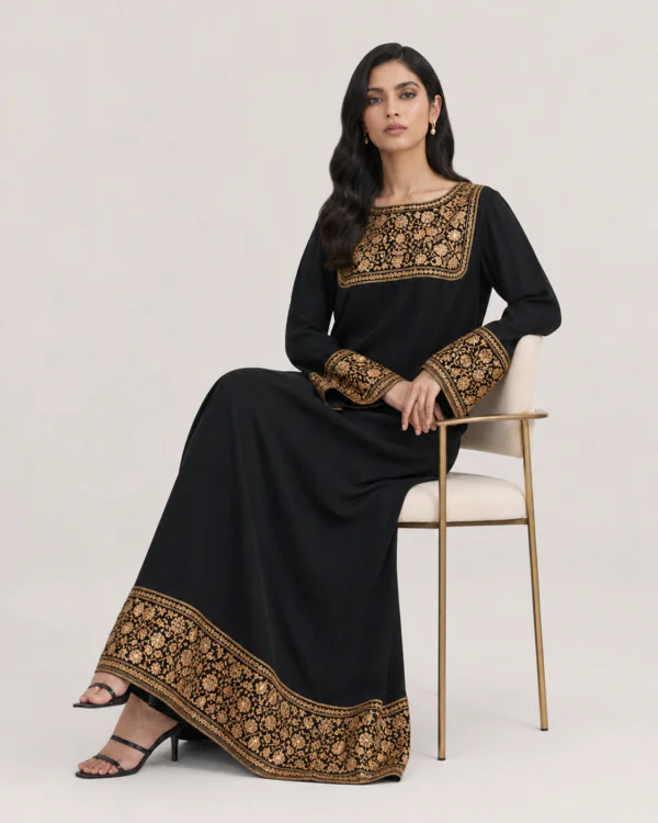elrare black gold embroidered event maxi dress seated
