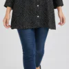 elrare black polka dot shirt tunic hem closeup