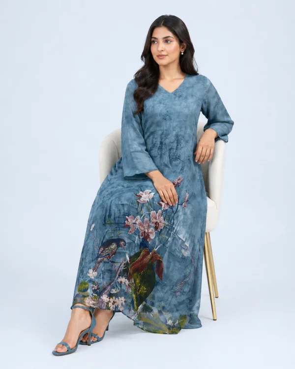 elrare blue botanical bird maxi dress seated