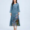 elrare blue botanical bird maxi dress walking pose