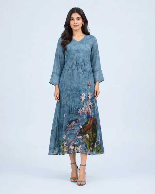 elrare blue botanical bird maxi dress walking pose