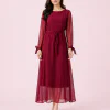 elrare burgundy pleated belted maxi dress walking pose