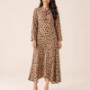 elrare camel floral maxi dress walking pose