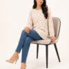 elrare cream polka dot bell top seated