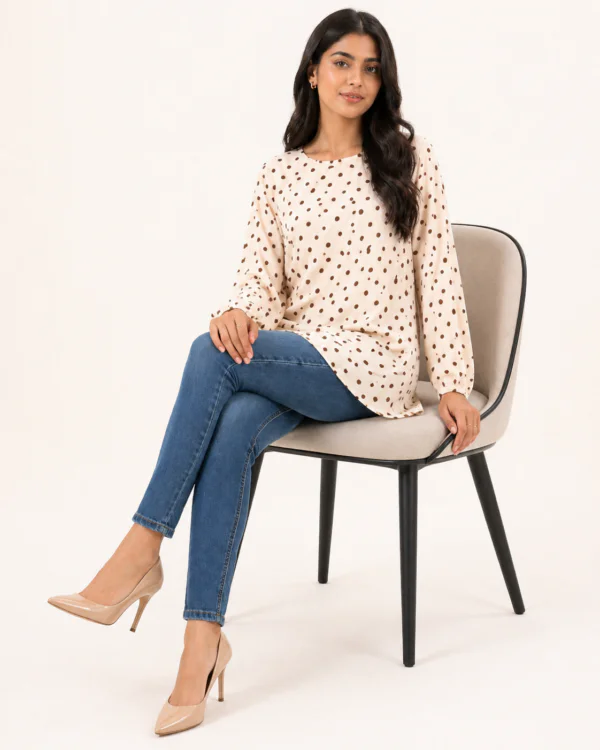 elrare cream polka dot bell top seated