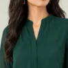 elrare emerald green bell sleeve tunic neckline detail