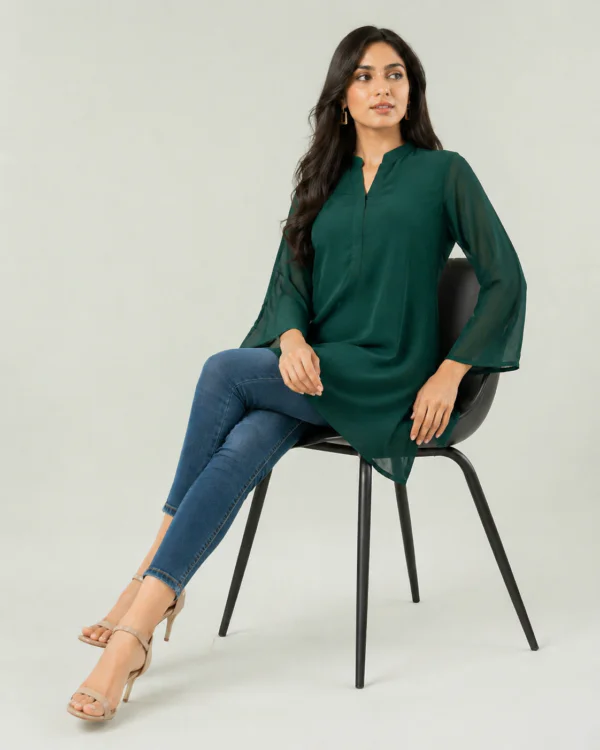 elrare emerald green bell sleeve tunic seated