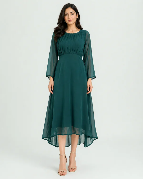 elrare emerald green chiffon maxi dress walking pose