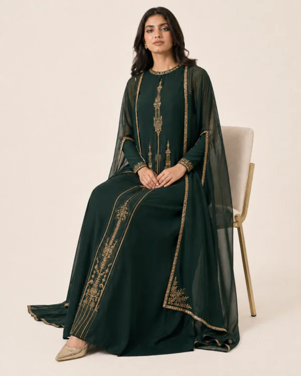 elrare forest green gold cape maxi dress seated