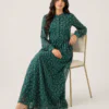 elrare green ditsy floral maxi dress seated