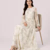 elrare ivory botanical floral maxi dress seated
