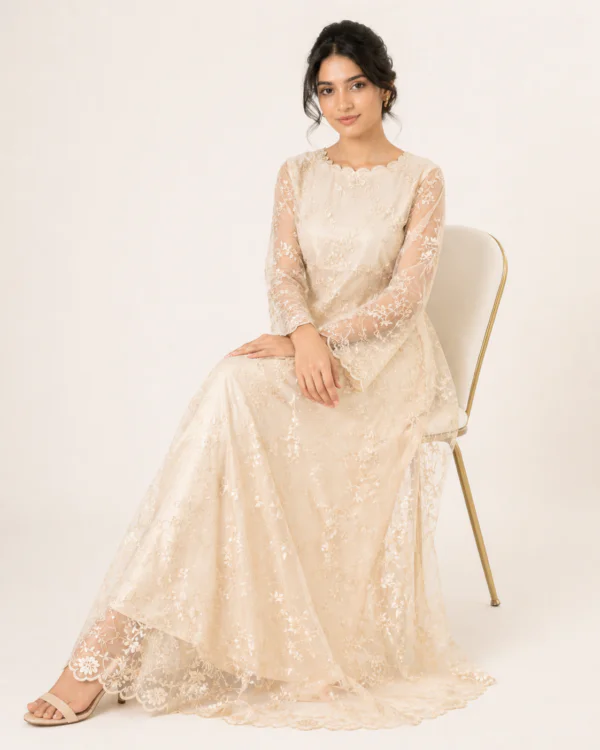 elrare ivory sheer embroidered maxi dress seated