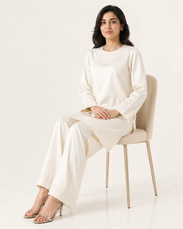 elrare ivory wide leg coords seated