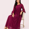 elrare magenta ruffle sleeve maxi dress seated