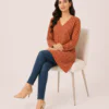 elrare rust tile print tunic seated