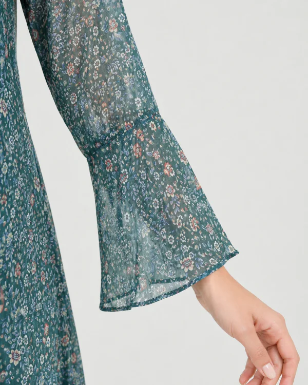 elrare teal scatter floral maxi dress seated