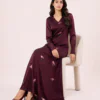 elrare wine rose petal satin maxi dress seated