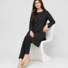elrare black white grid tunic seated