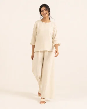 elrare cream linen ruffle lounge front view