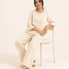 elrare cream linen ruffle lounge seated