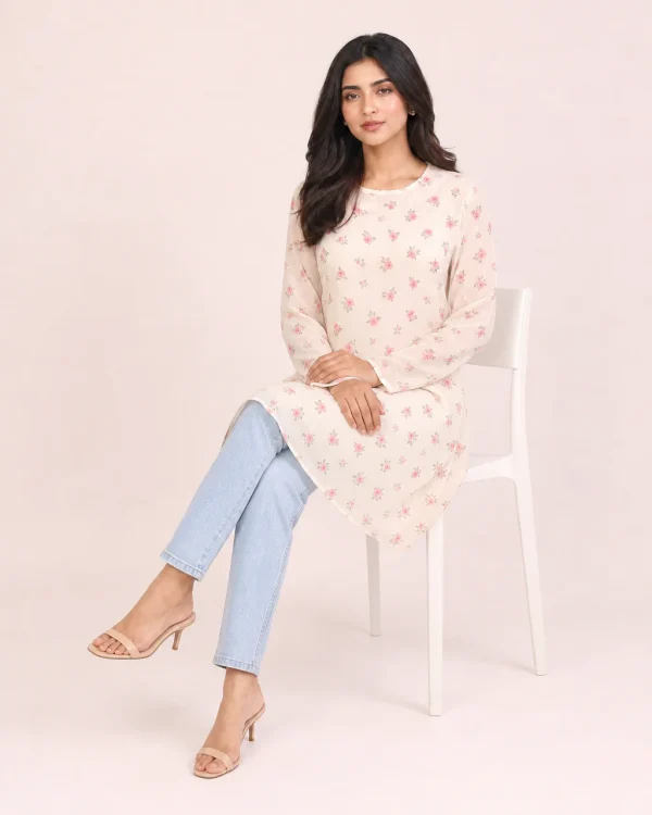 elrare cream pink ditsy tunic seated