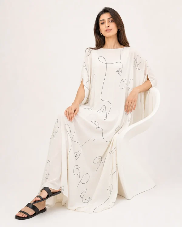 elrare ivory black sketch kaftan seated