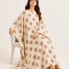elrare ivory rust medallion kaftan seated