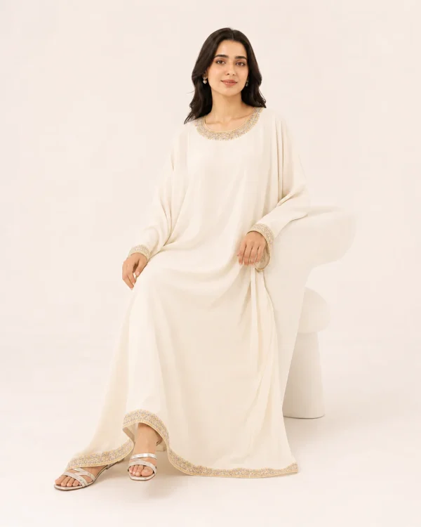 elrare ivory tilla kaftan seated