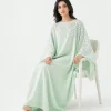 elrare mint schiffli kaftan seated