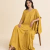 elrare mustard leaf kaftan seated