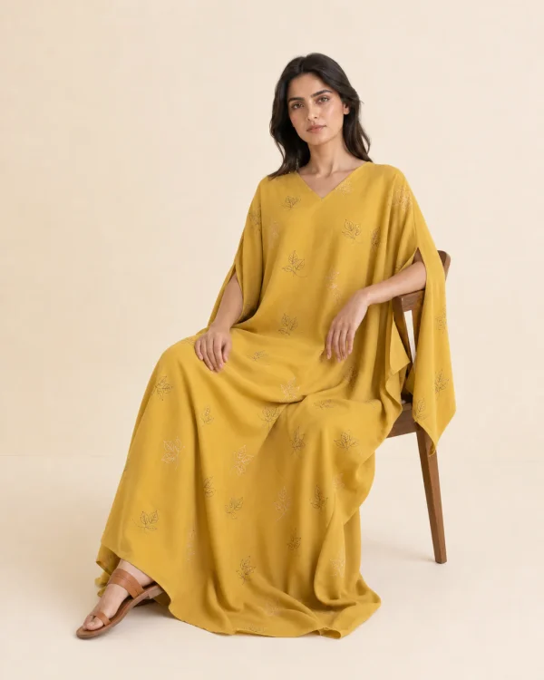 elrare mustard leaf kaftan seated
