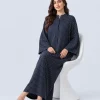 elrare navy ivory stripe kaftan seated