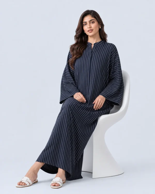 elrare navy ivory stripe kaftan seated