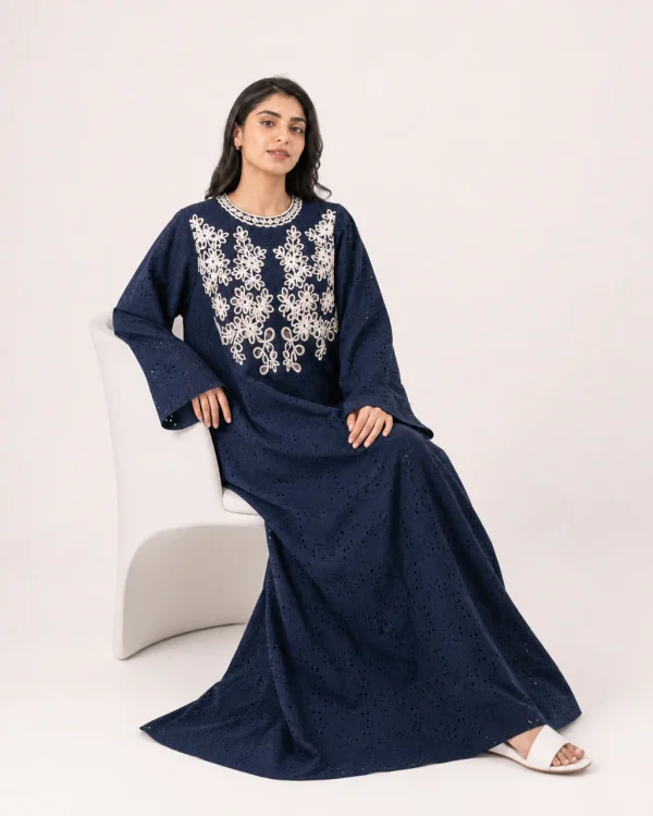 elrare navy schiffli kaftan seated