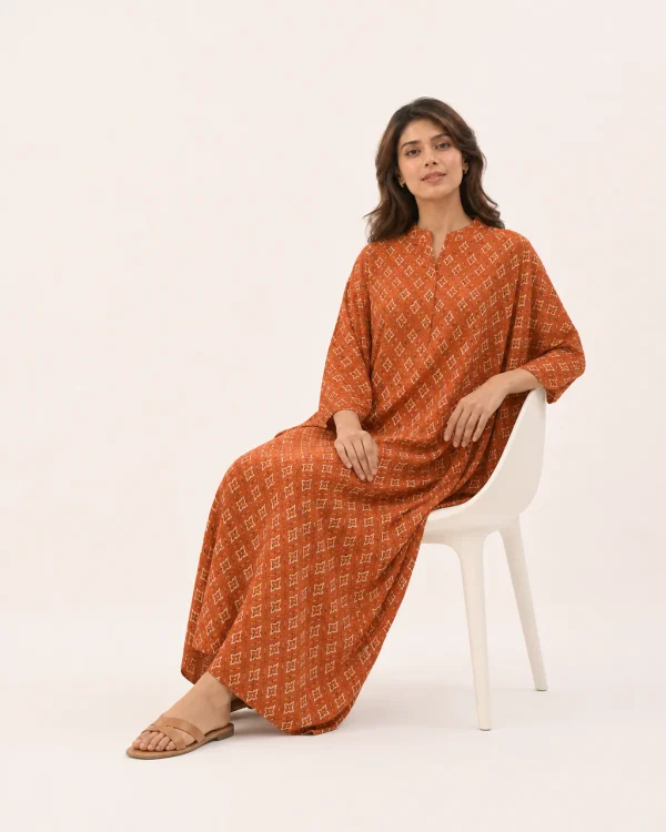 elrare rust geometric kaftan seated