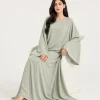 elrare sage solid kaftan seated