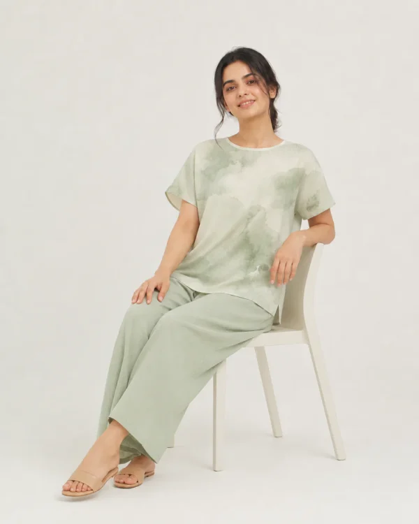elrare sage watercolor wash lounge seated