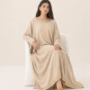 elrare sand gota kaftan seated