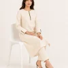elrare warm ivory contrast loop coords seated